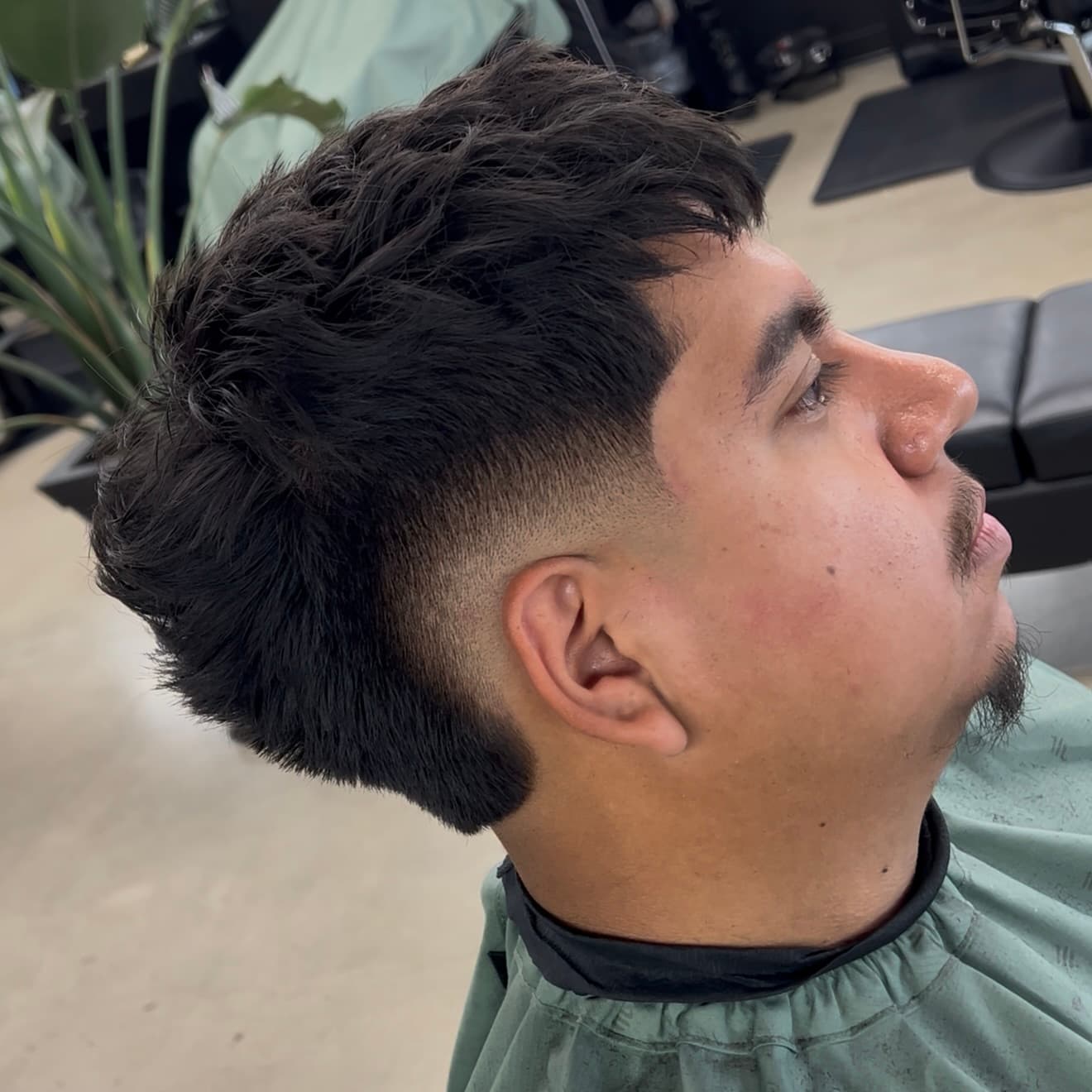 Textured mullet with taper fade by Mike Drop Fades barber